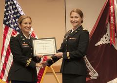 Second Lt. Molly E. Darney receiving certificate at William Beaumont Army Medical Center CNTP graduation ceremony