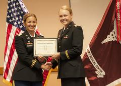 Second Lt. Anna L. Woudenberg receiving certificate at William Beaumont Army Medical Center CNTP graduation ceremony