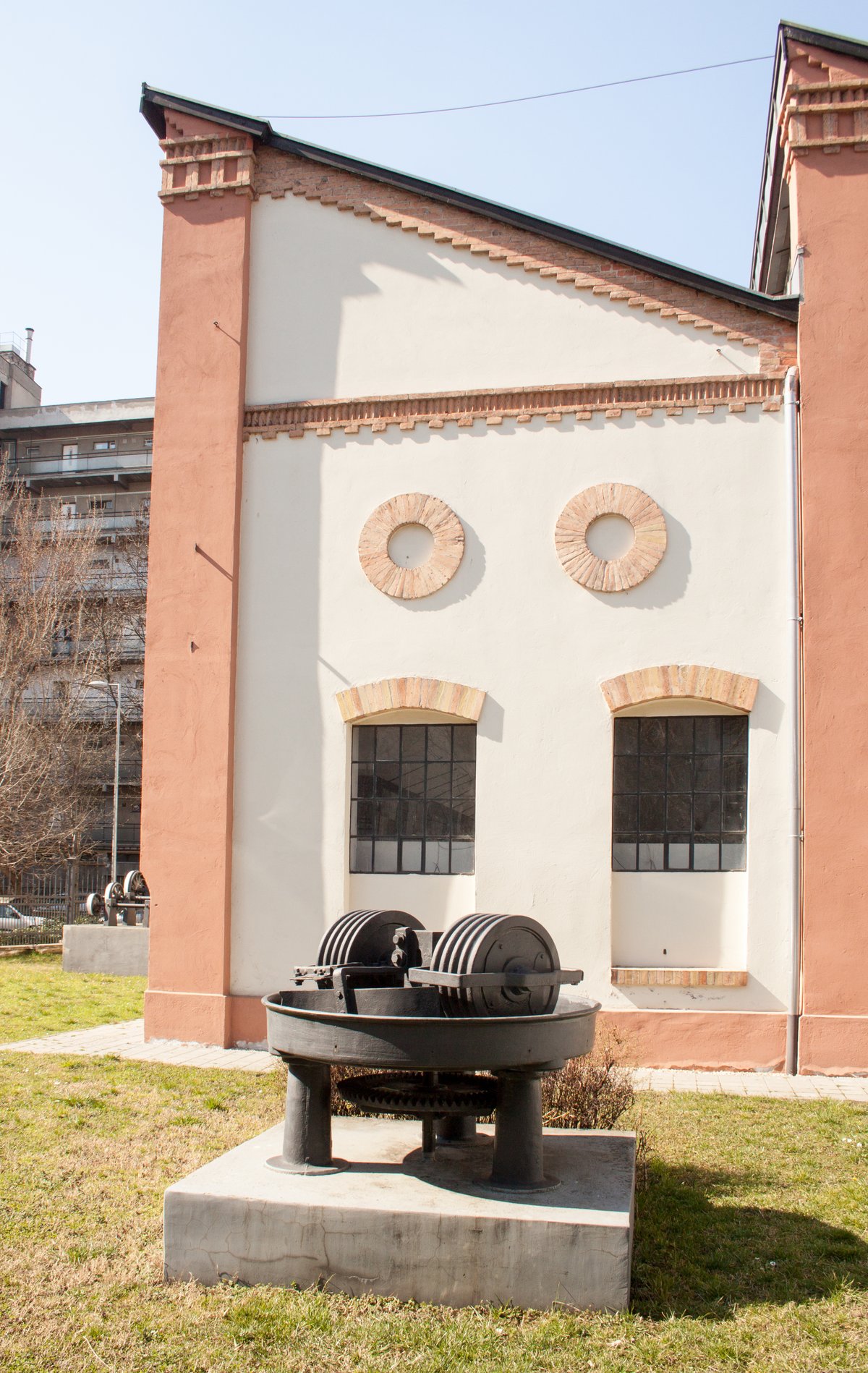 Outdoor view of the Foundry Museum with various foundry products displayed in a garden setting