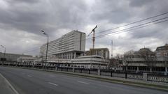 Bauman University campus viewed from the Yauza River with modern buildings and greenery