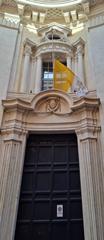 Flag at half-mast in front of the Congregation for the Evangelization of Peoples building