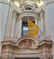Flag at half-mast in front of the Congregation for the Evangelization of Peoples building