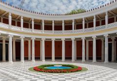 Courtyard of the Zappeion in Athens Greece with classical architecture and blue sky
