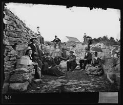 Ruins of monastery on Hovedøya island in Oslo, Norway with a group of people