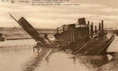Scuttled German tug Diomedes and a barge at Zeebrugge after World War I Armistice