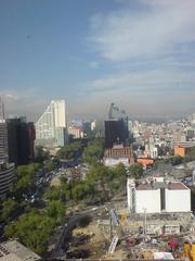 Mexico City skyline with modern skyscrapers and buildings under clear blue sky
