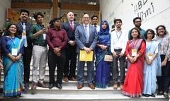 Ambassador Peter Haas delivering opening remarks at Projonmo Wave outreach event at University of Dhaka on June 2, 2022