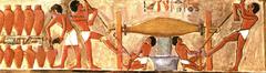 Ancient Egyptian grape pressing scene fresco from the tomb of Puyemre in Thebes