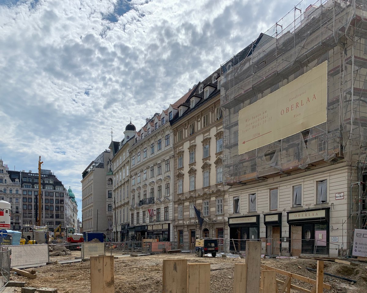 Construction site at Neuer Markt in Vienna with scaffolding and cranes