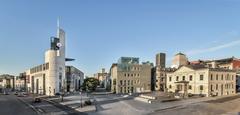 Pointe-à-Callière archaeological and history museum in Montreal with city skyline at sunset