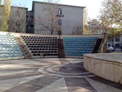 Amphitheatre at Gazi University with tiered stone seating and trees in the background