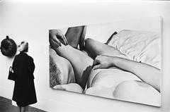 Woman viewing the feminist artwork titled 'literally and figuratively' by Joan Semmel at the 'Feministische kunst, internationaal' exhibition in Haags Gemeentemuseum, The Hague, 1979