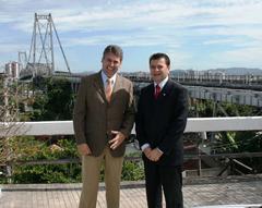 Deputy Elizeu Mattos and State Secretary of Infrastructure Mário Mariani in front of Hercílio Luz Bridge in Florianópolis SC