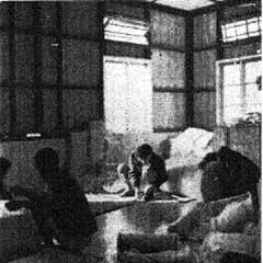 Lushai workers inside the Reid House storage building