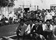 Lushai village welfare meeting with community members gathered outdoors
