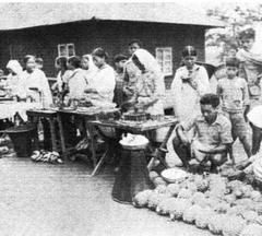 Cotton bazaar in Aizawl with booths and people