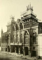 Paradise Theater building in Moscow with ornate architectural details under a blue sky