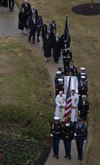 Ceremonial Honor Guard carrying former President George H.W. Bush's casket to George Bush Presidential Library in College Station Texas 2018