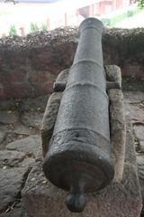 19th century cannon displayed in a museum