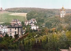 Scenic view of Neroberg hill with lush greenery and historic buildings in Wiesbaden