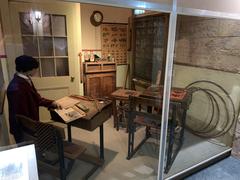 Old school classroom at the Museum of Childhood in Edinburgh with vintage desks and educational tools