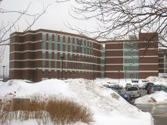 University of Massachusetts Boston campus center building with modern architecture and landscaping