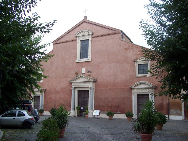 Exterior view of Basilica di San Pancrazio in Rome under a clear blue sky