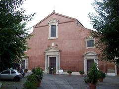 Exterior view of Basilica di San Pancrazio in Rome under a clear blue sky