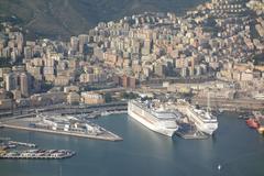 Aerial view of the Harbour of Genoa in Italy with docked ships and waterfront buildings