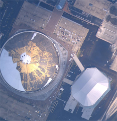 Overhead view of New Orleans Superdome and Arena surrounded by floodwaters after Hurricane Katrina 2005