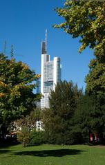 Commerzbank Tower seen from Metzler Park with clear sky