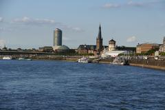 Rheinuferpromenade in Düsseldorf along the river on a clear day