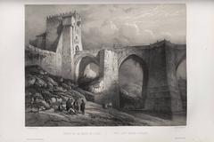 Puente de San Martín medieval stone bridge over the Tagus River in Toledo, Spain