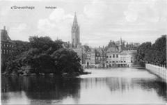 Historic view of Hofvijver pond in The Hague with the old prison gate and surrounding buildings