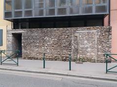Medieval enclosure wall of the Saint-Jean cloister behind the MJC in Lyon 5th arrondissement