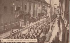 Street view of Vilnia showing historic buildings on Daminikanskaja street in 1915