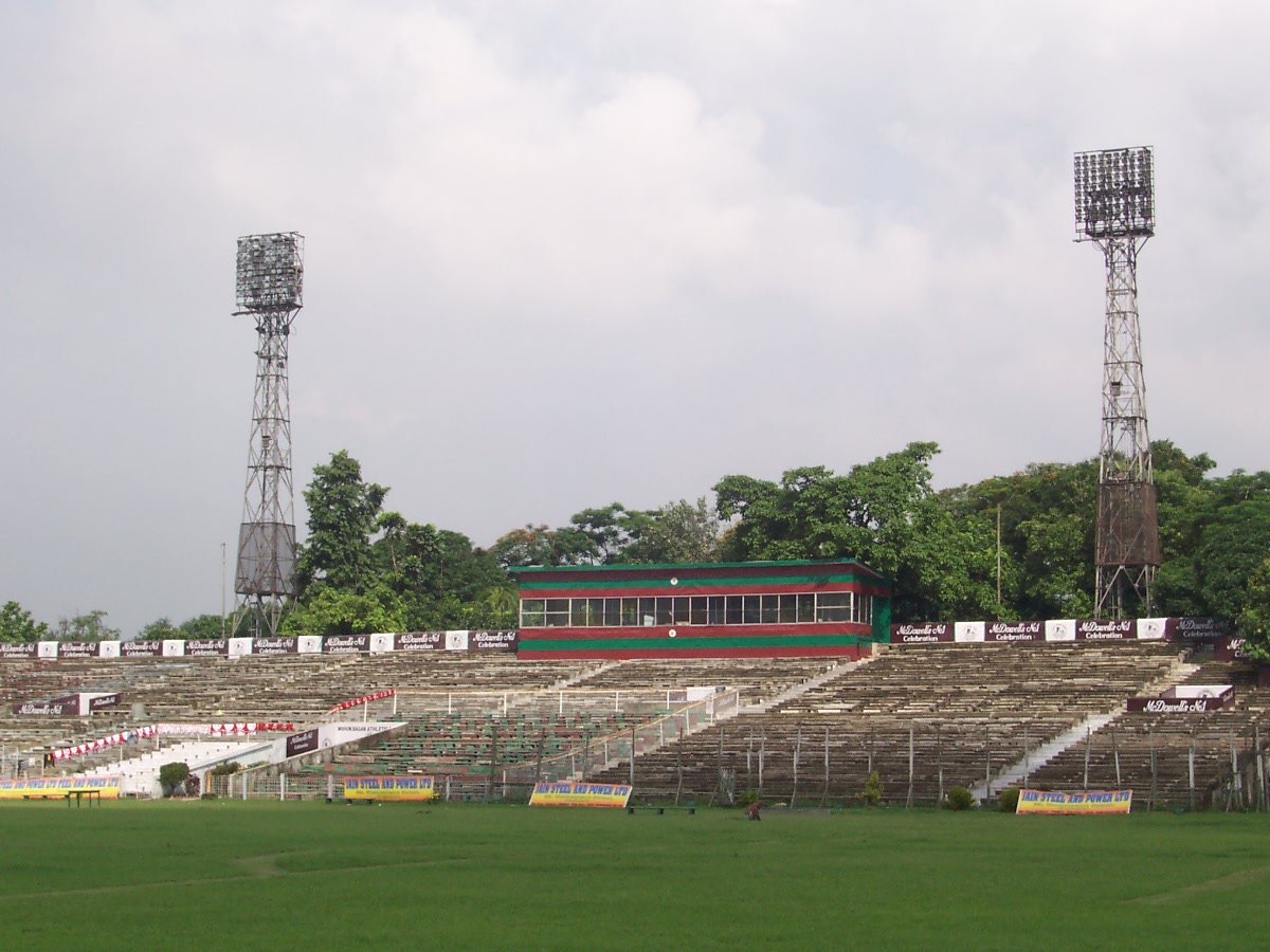 Mohun Bagan AC football ground with empty stands and green field