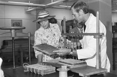 Queen Beatrix visiting the book restoration department at the Royal Library in The Hague in 1982