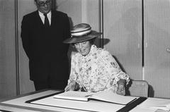 Queen Beatrix signing the guestbook at the opening of the Royal Library in The Hague on September 28, 1982