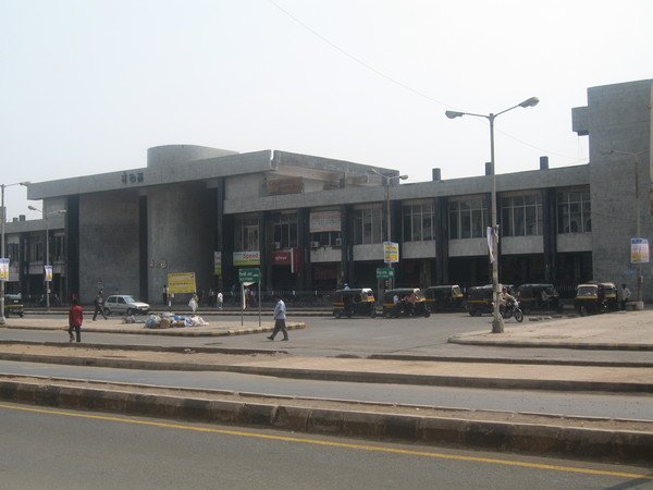 Nerul Railway Station west side view with three large hoardings obstructing the facade