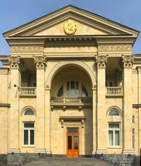Prime Minister's Residence in Yerevan with elegant classical architecture under a partly cloudy sky
