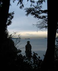 Siwash Rock silhouette at sunset in Vancouver Canada