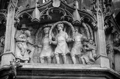 Artistic relief depiction of the Schäffler dance at the New Town Hall Munich