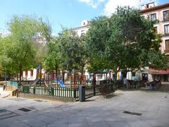 Plaza del Dos de Mayo in Malasaña neighborhood, Madrid during daytime with historic buildings and street life