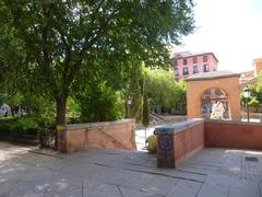 Vibrant view of Malasaña district's Plaza del Dos de Mayo in Madrid