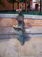 Plaza del Dos de Mayo in Malasaña, Madrid with colorful buildings and outdoor cafes