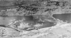 German battleship Tirpitz partially concealed by smoke screens in Kaafjord during World War II