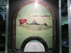 Part of a bulkhead from the German battleship Tirpitz painted by crew, on display at RAF Museum Hendon