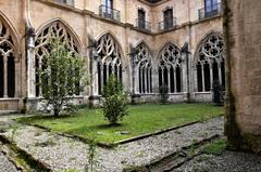 Monastery garden of the cathedral of Oviedo with lush greenery and trees
