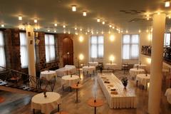 Interior of Gürzenich Festhalle Marsiliussaal in Köln with ornate ceiling and chandelier
